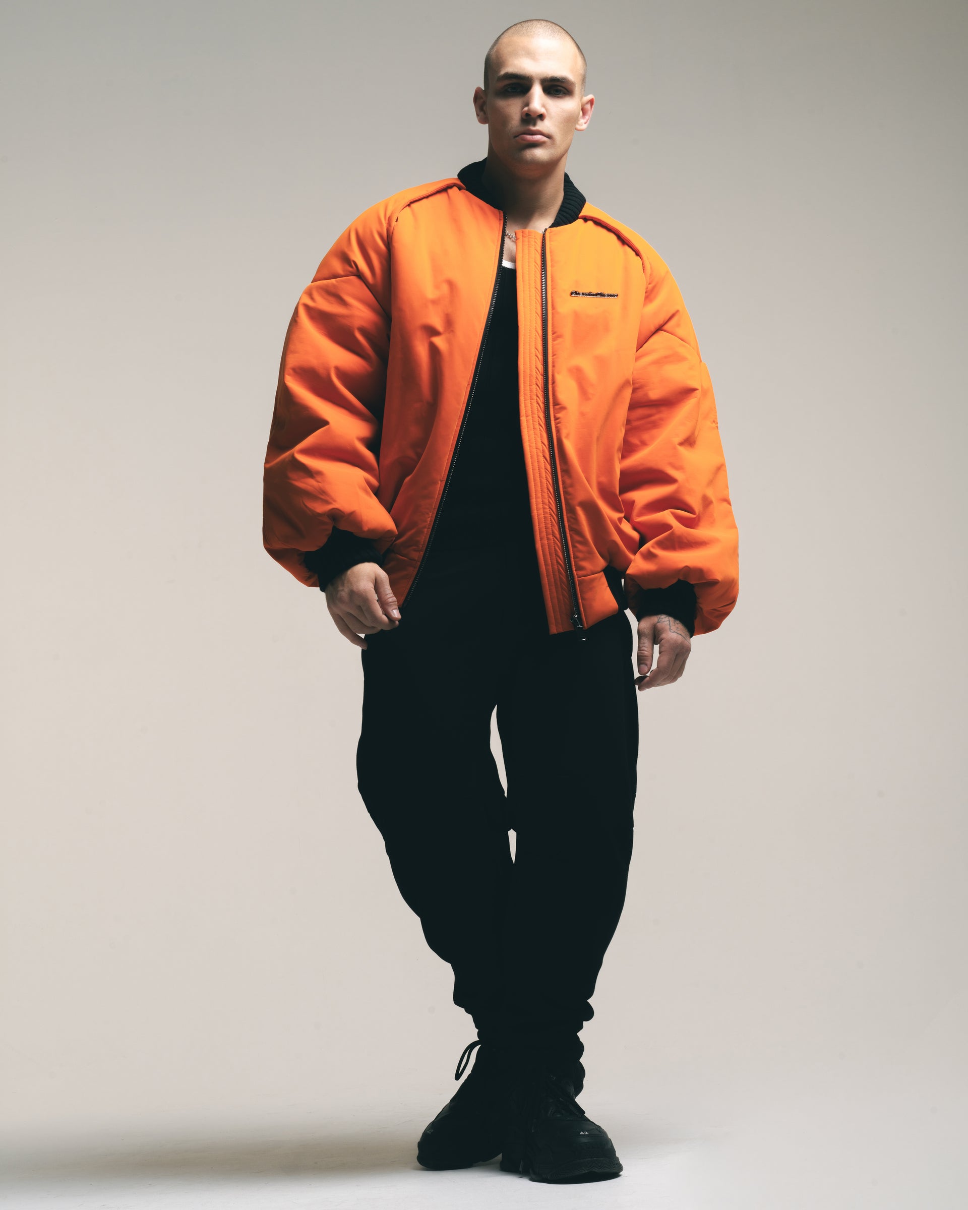 orange "retrocar" bomber jacket