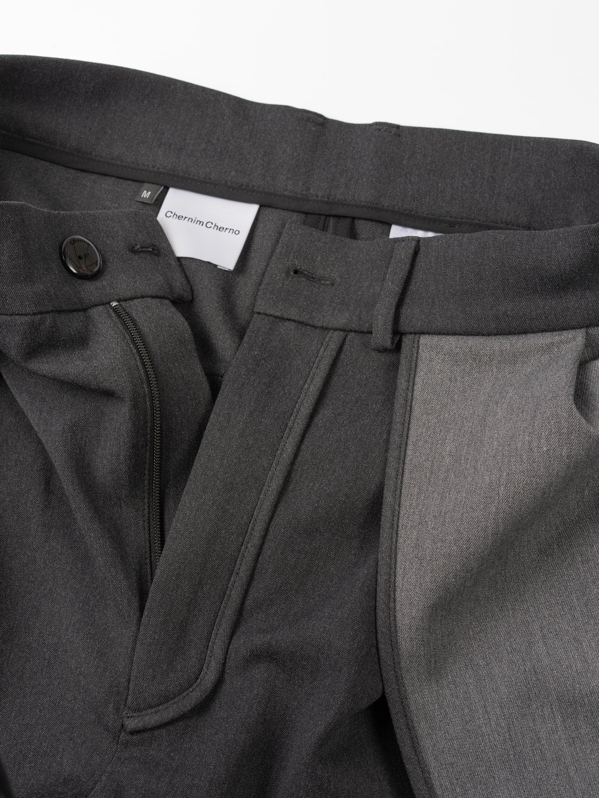 grey trousers with patch pockets