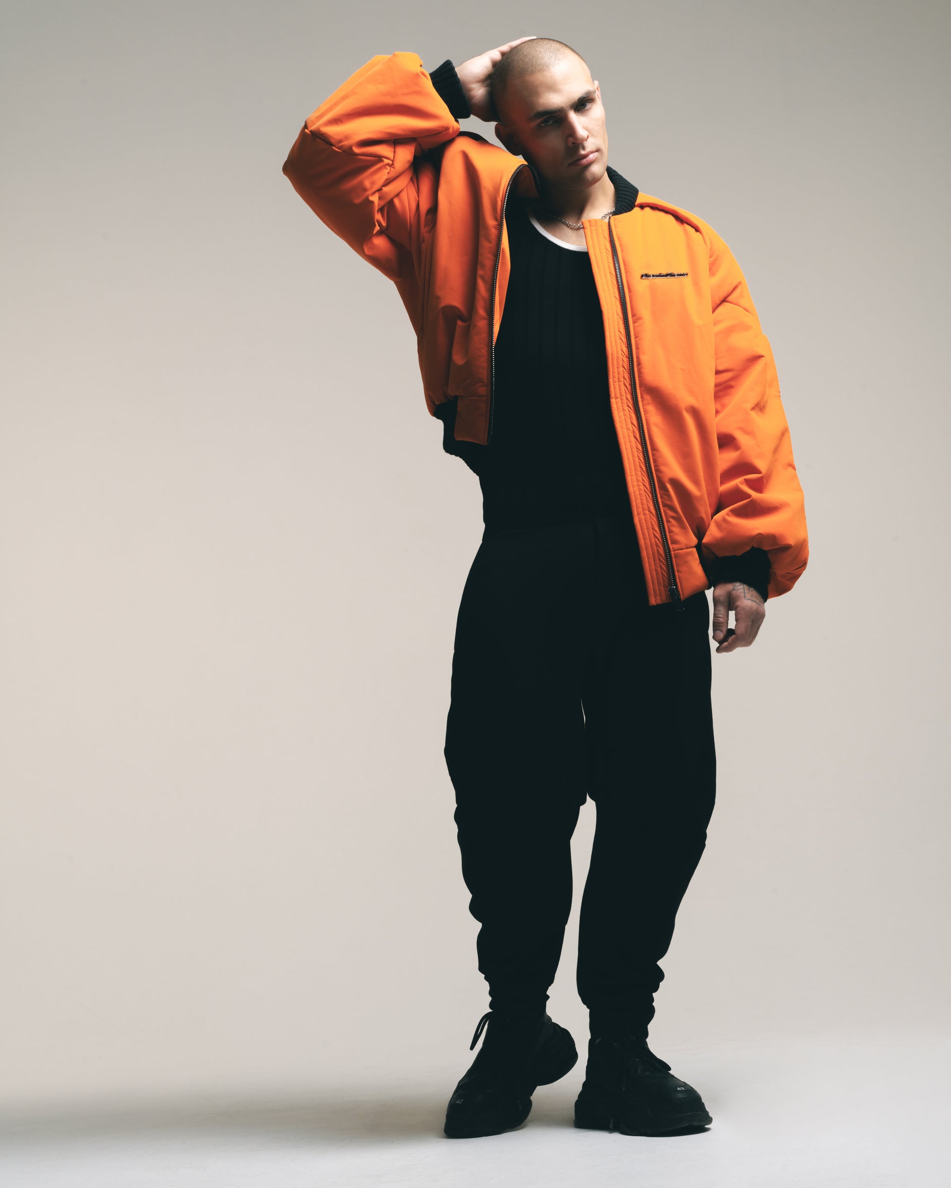 orange "retrocar" bomber jacket