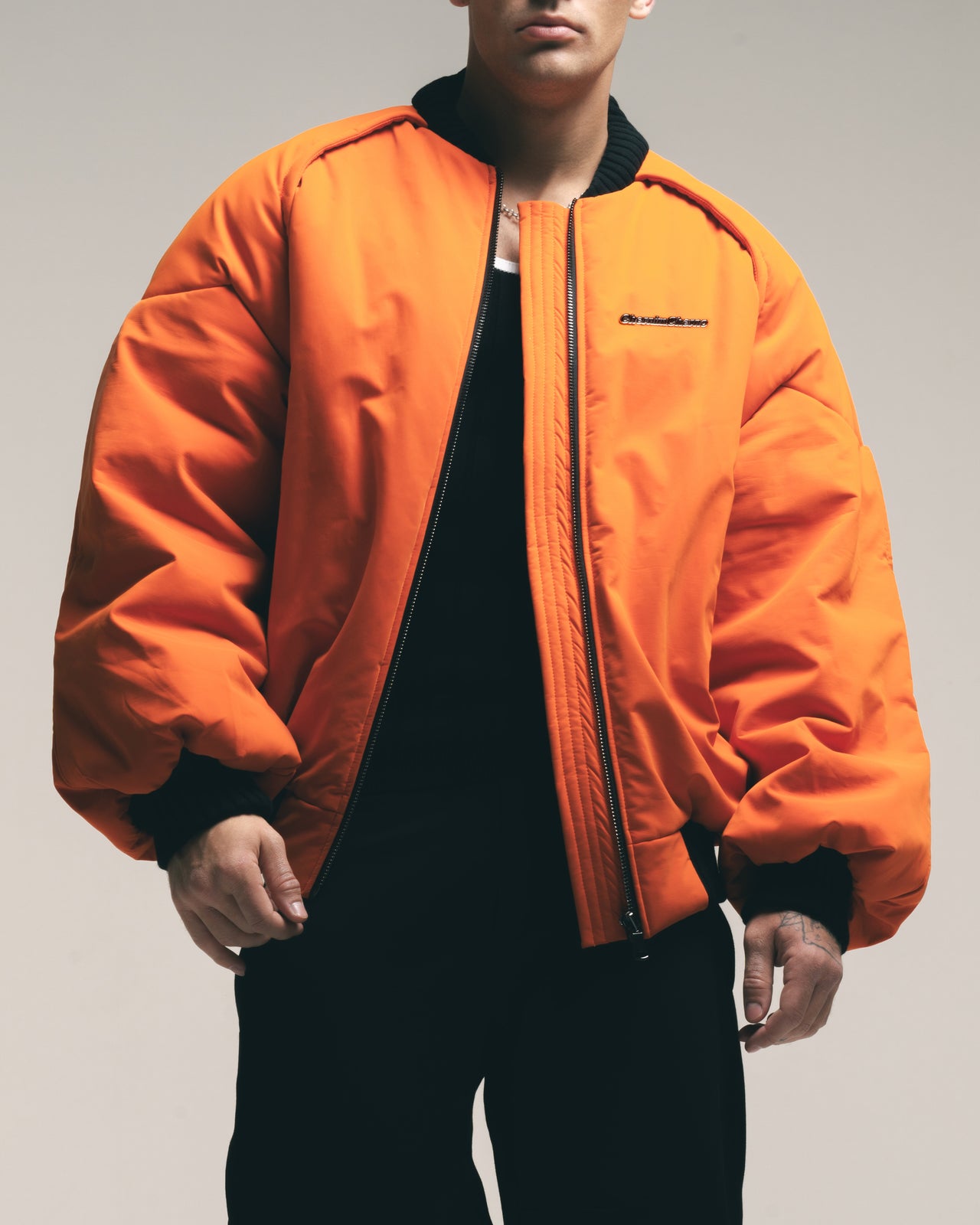 orange "retrocar" bomber jacket