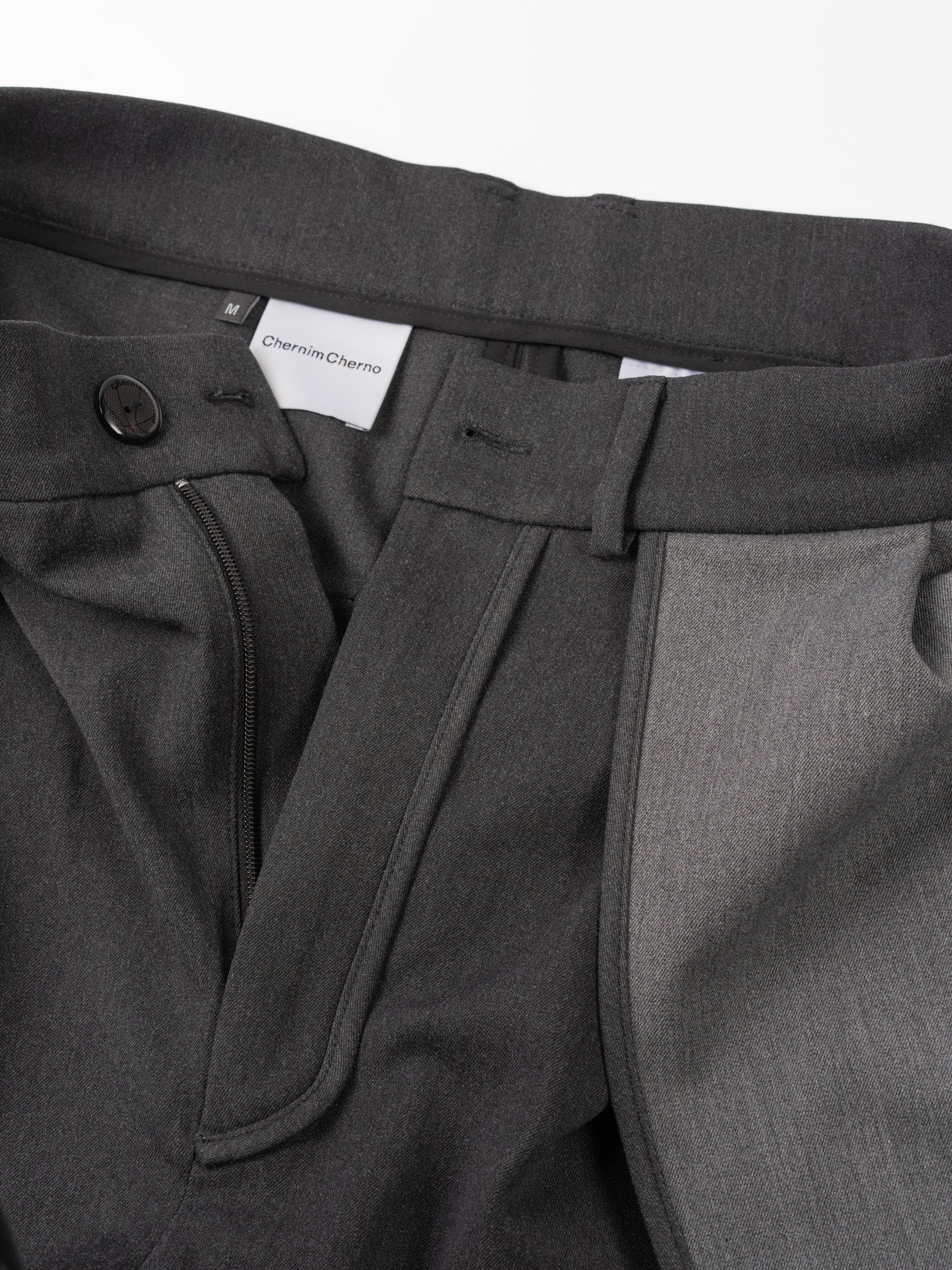 grey trousers with patch pockets